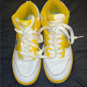 Nike Women’s Yellow and White Hightop Dunks